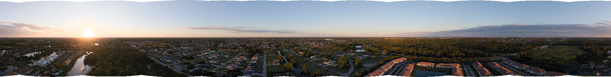 Stitched sunset aerial panorama over the residential community